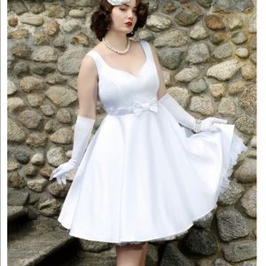 Brand new, never worn white Satan Cherry Velvet wedding a-frame dress